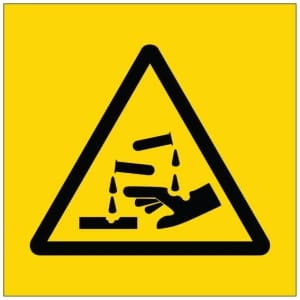 Syövyttävää symboli kyltti